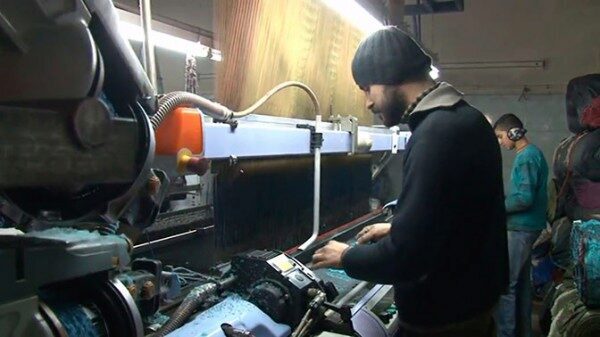 Крупнейшая в Сирии ткацкая фабрика Алеппо возобновила работу